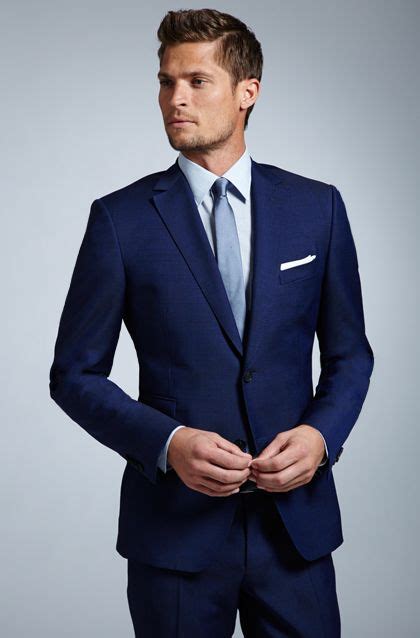 navy suit light blue tie